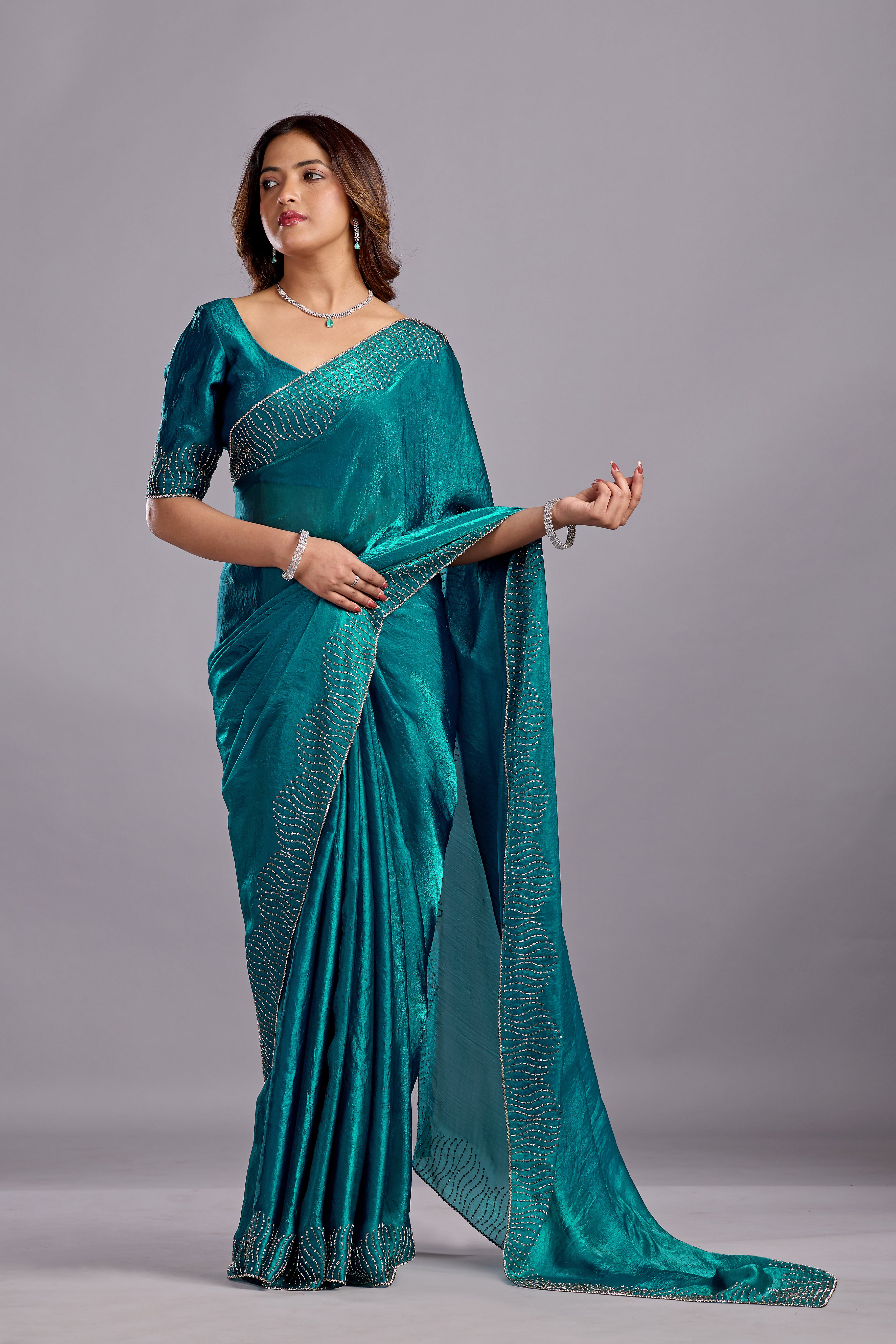 Teal Blue Tissue Silk Saree With Stone Work