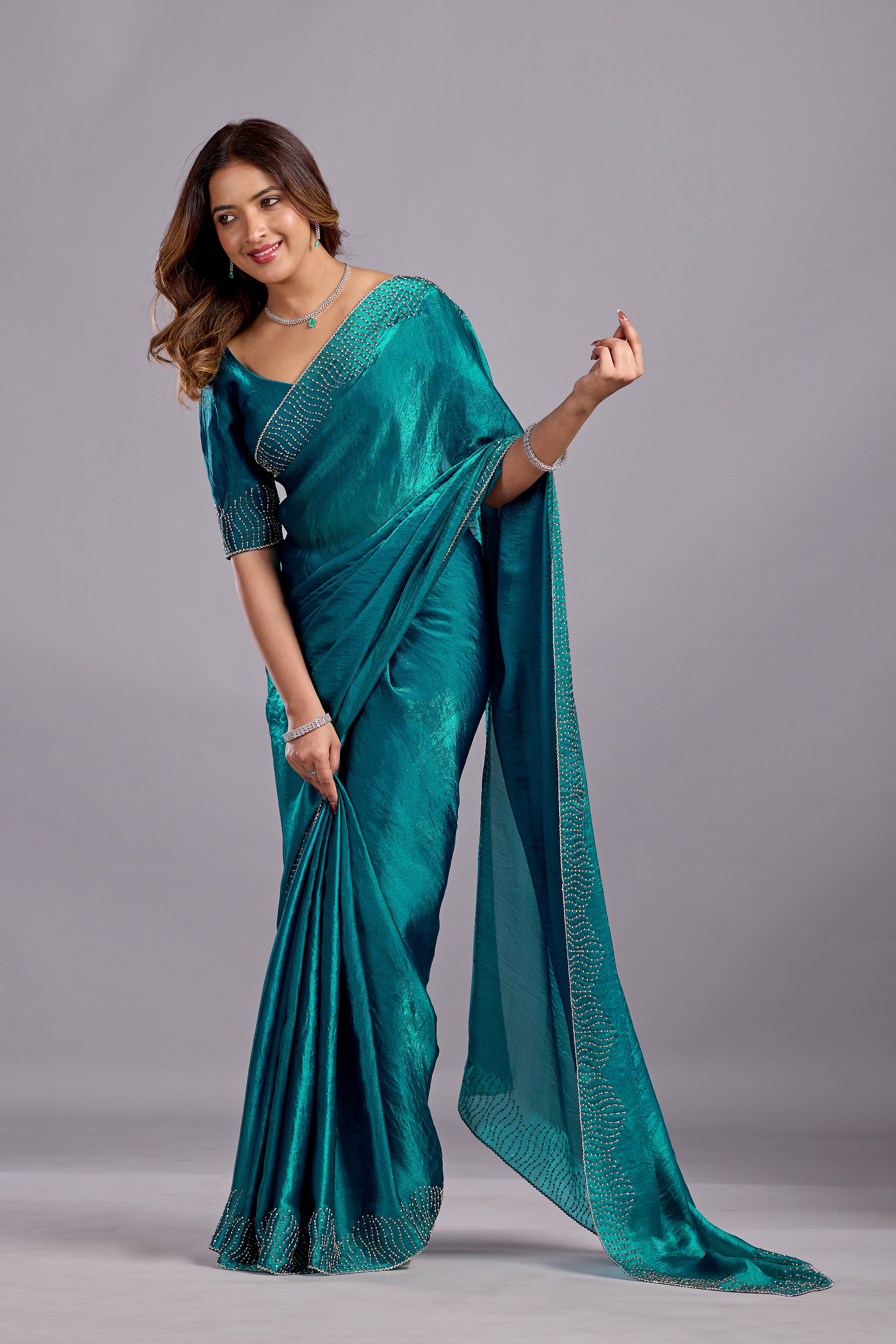 Teal Blue Tissue Silk Saree With Stone Work