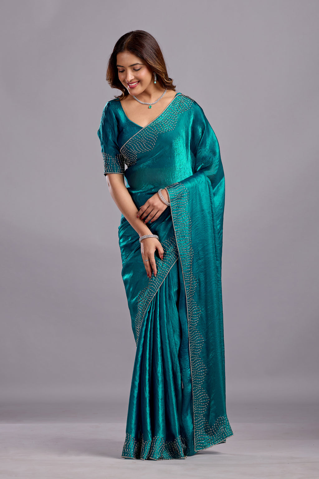 Teal Blue Tissue Silk Saree With Stone Work