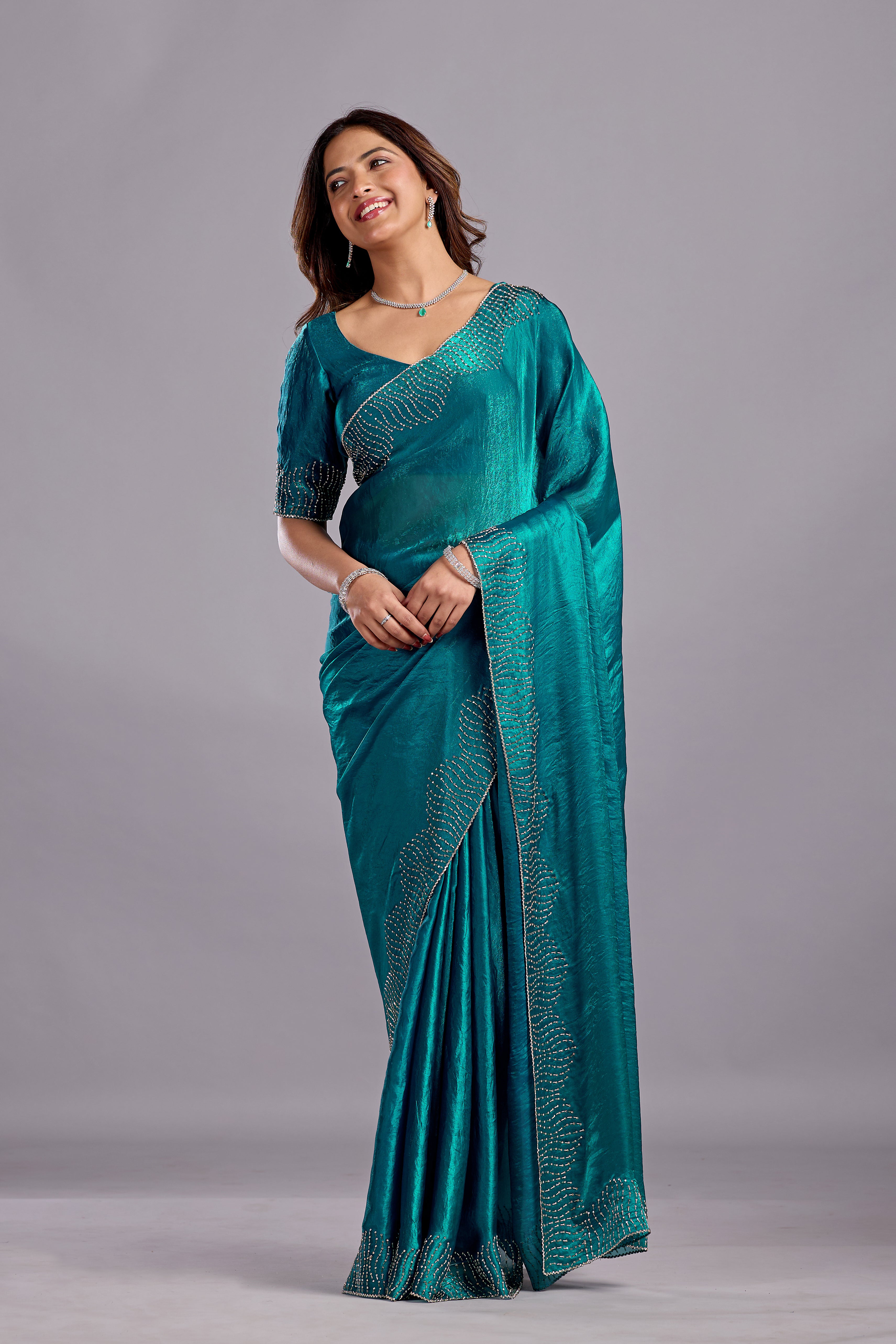 Teal Blue Tissue Silk Saree With Stone Work