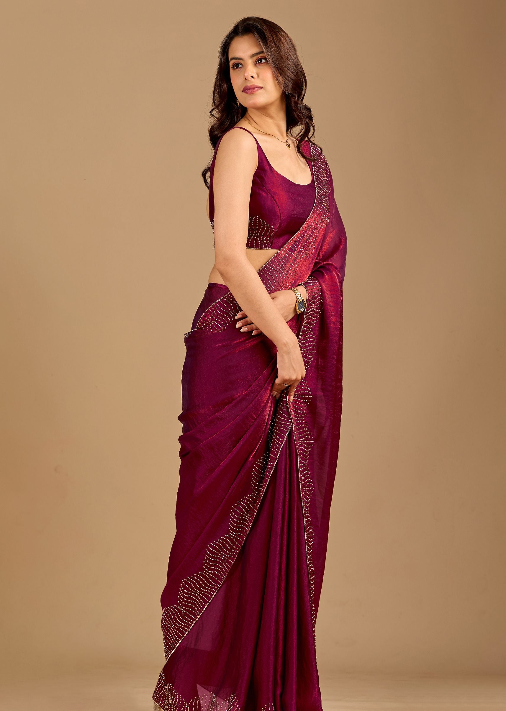 Wine Organza Saree with Stone Work Border & Designer Wave Pattern