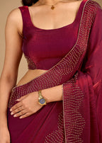 Wine Organza Saree with Stone Work Border & Designer Wave Pattern