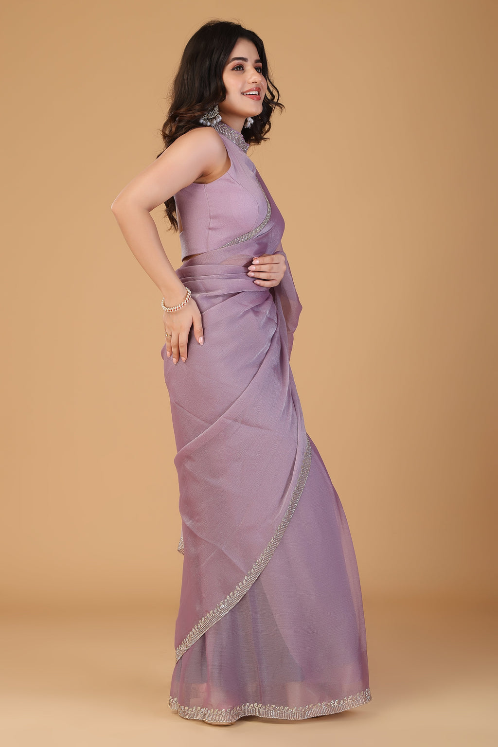 Lavender pink stone work tissue saree