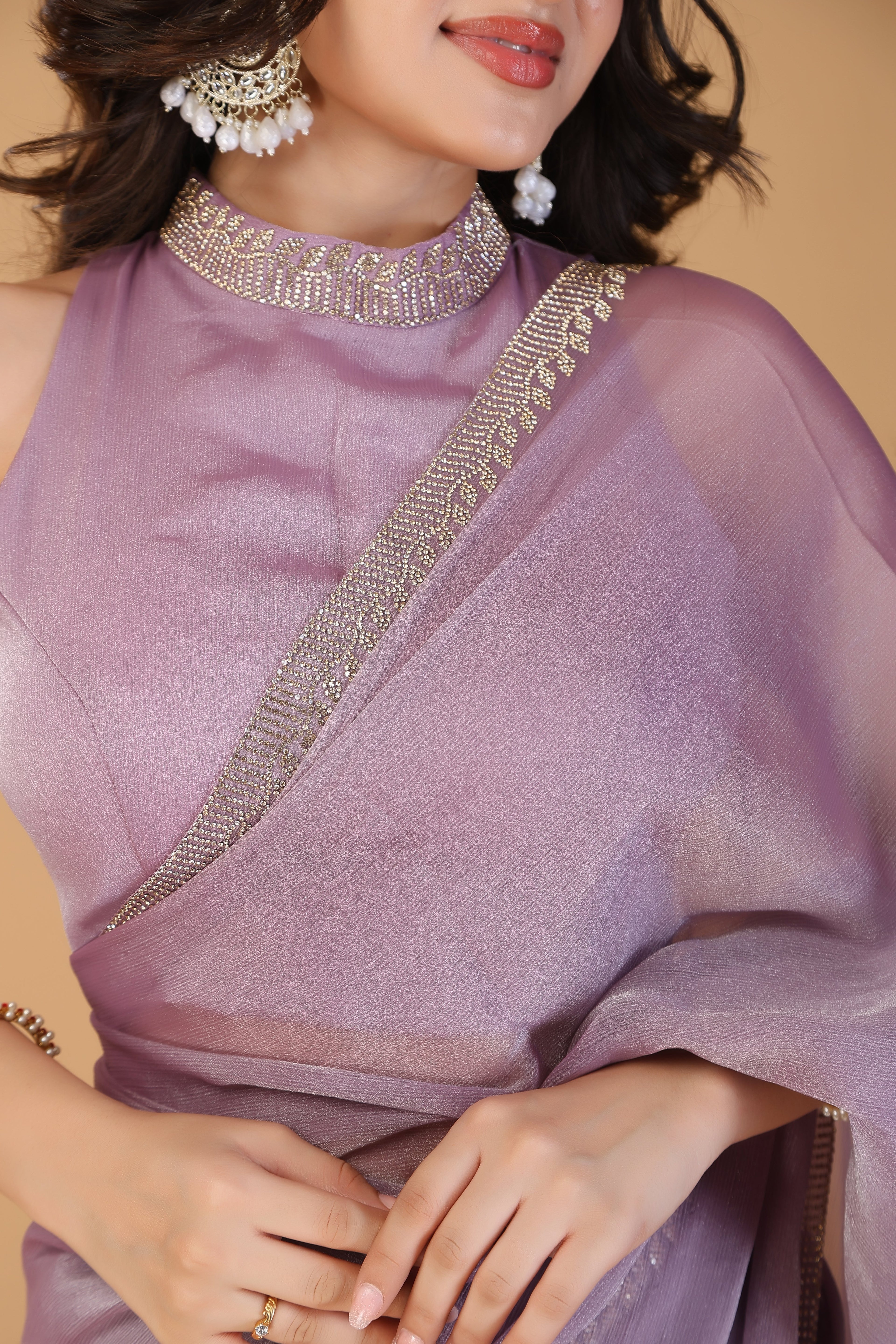 Lavender pink stone work tissue saree