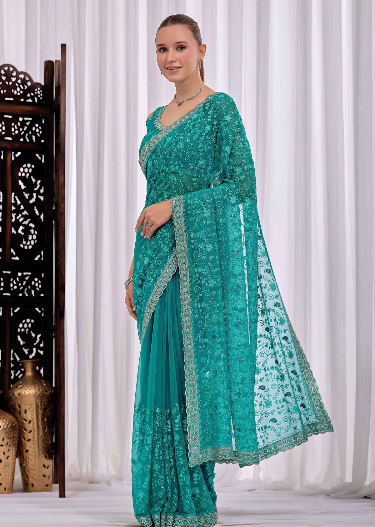 Firozi Chiffon Saree With Floral Embroidery And Stone Border