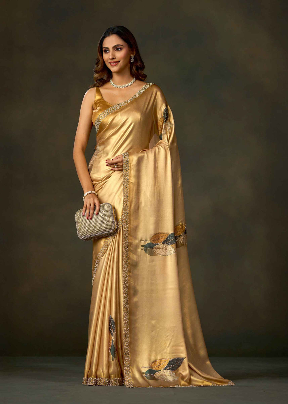 Golden Satin Silk Saree With Leaf Motifs And Embellished Border