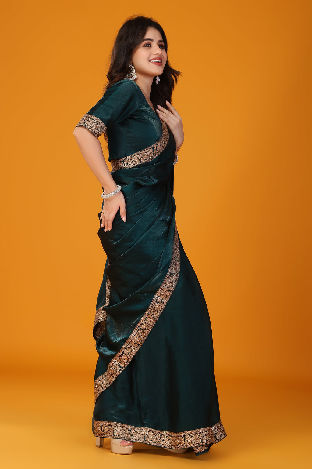 Green zari work soft tissue saree