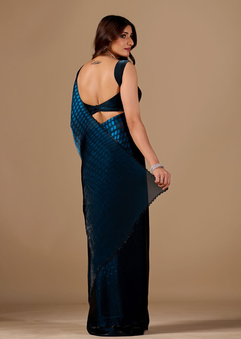 Teal Blue Organza Printed Saree with Stone Work Border Detailing
