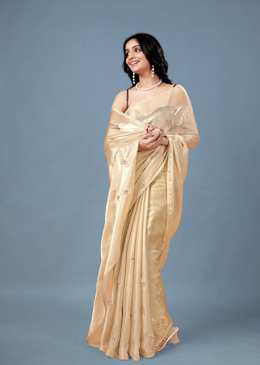 Cream Tissue Saree with Embroidered Buti Work and Shimmer Finish