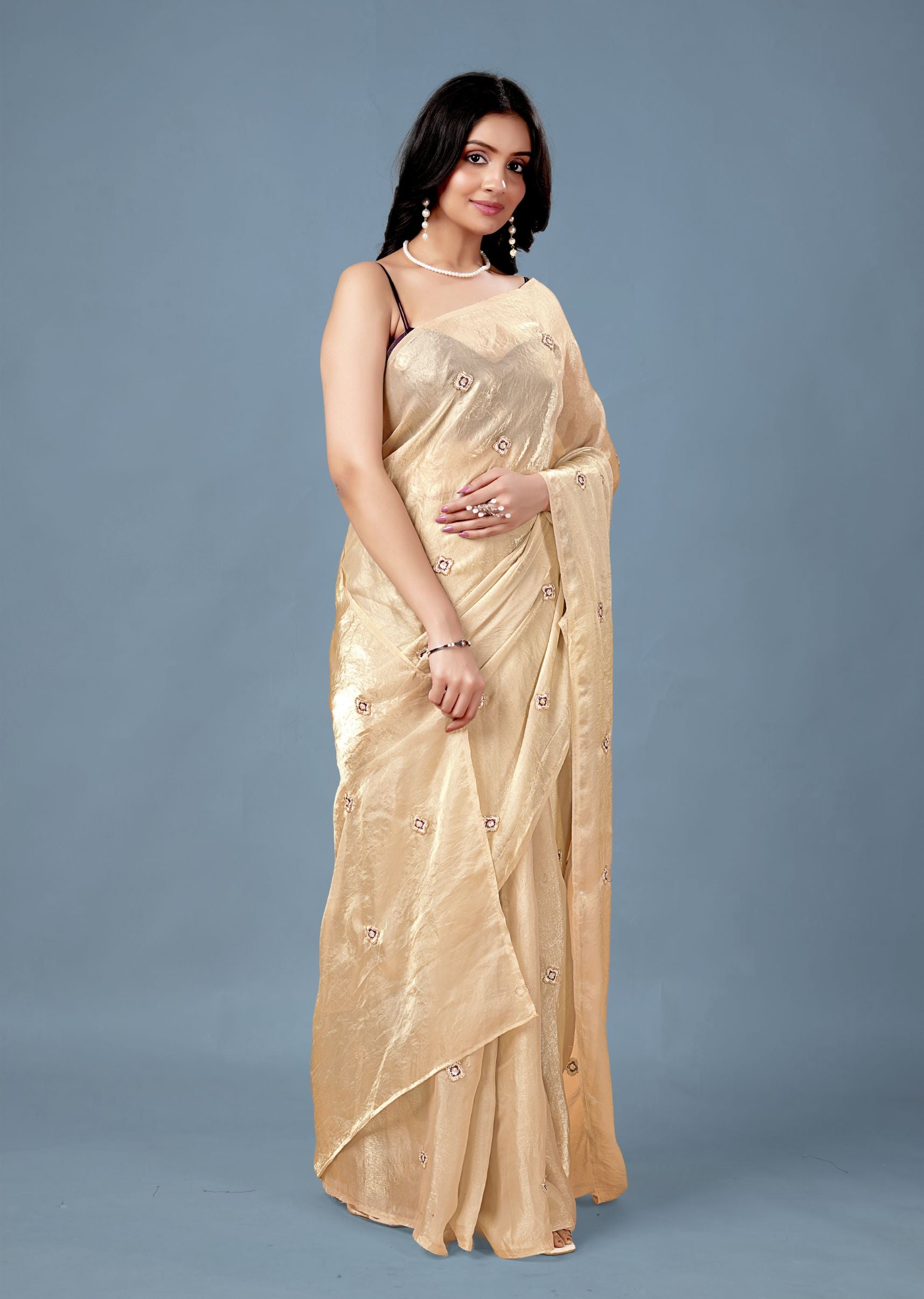 Cream Tissue Saree with Embroidered Buti Work and Shimmer Finish