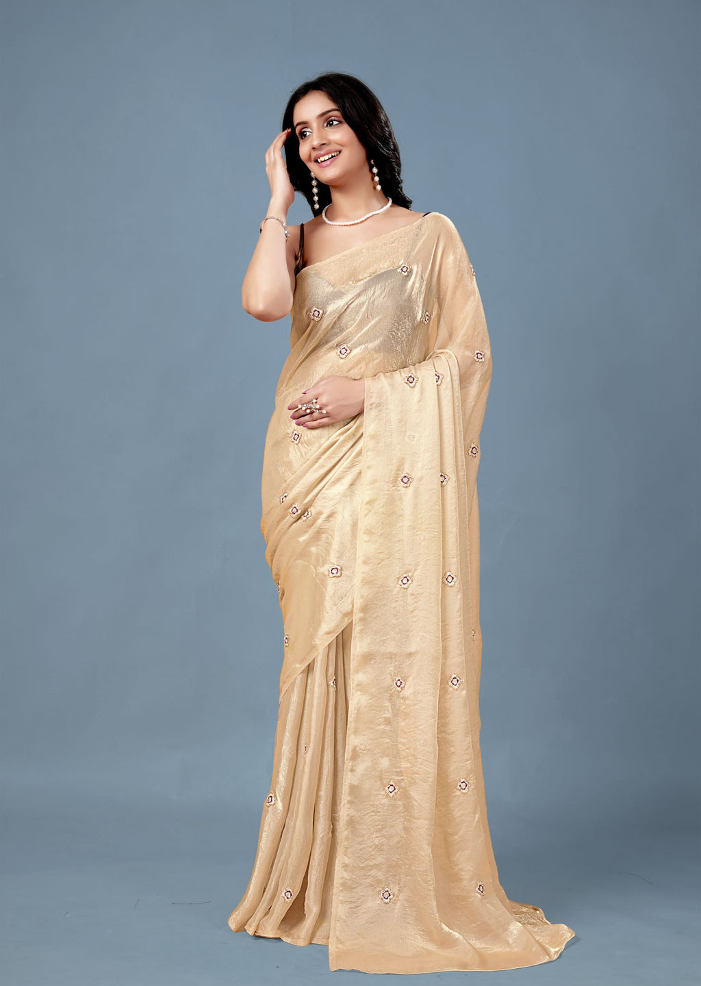 Cream Tissue Saree with Embroidered Buti Work and Shimmer Finish