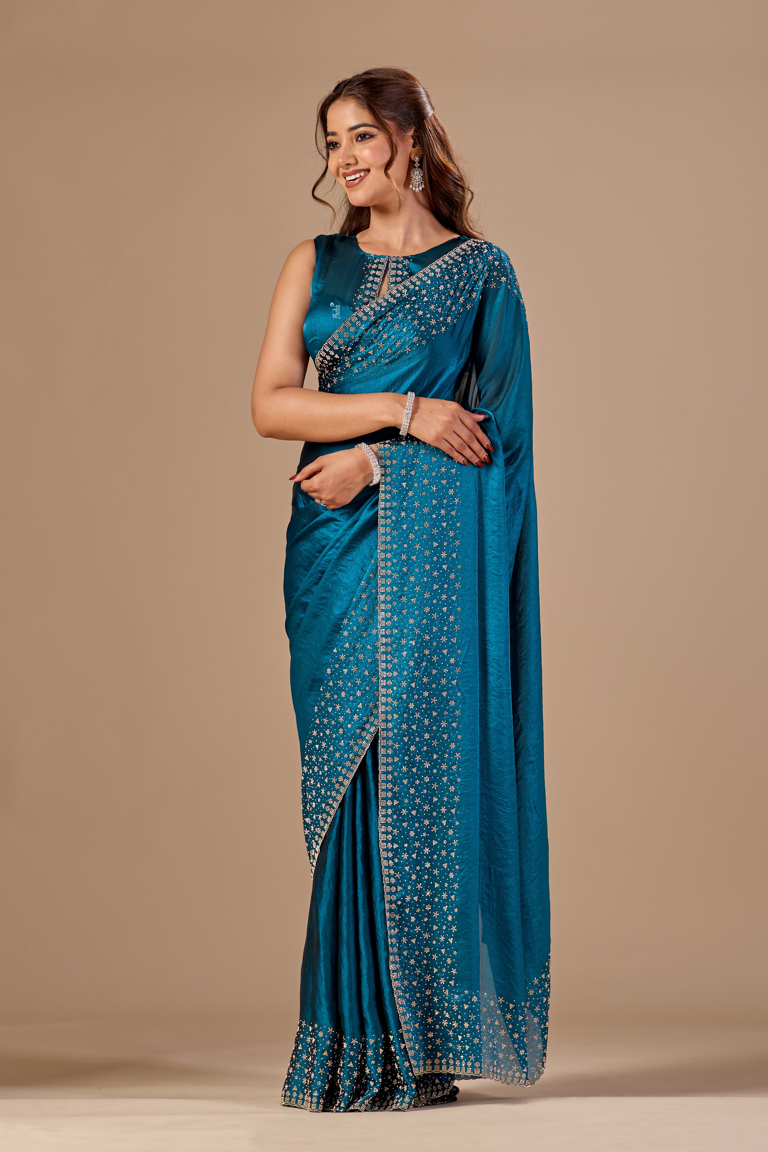 Teal Blue Tissue Silk Saree With Stone Work