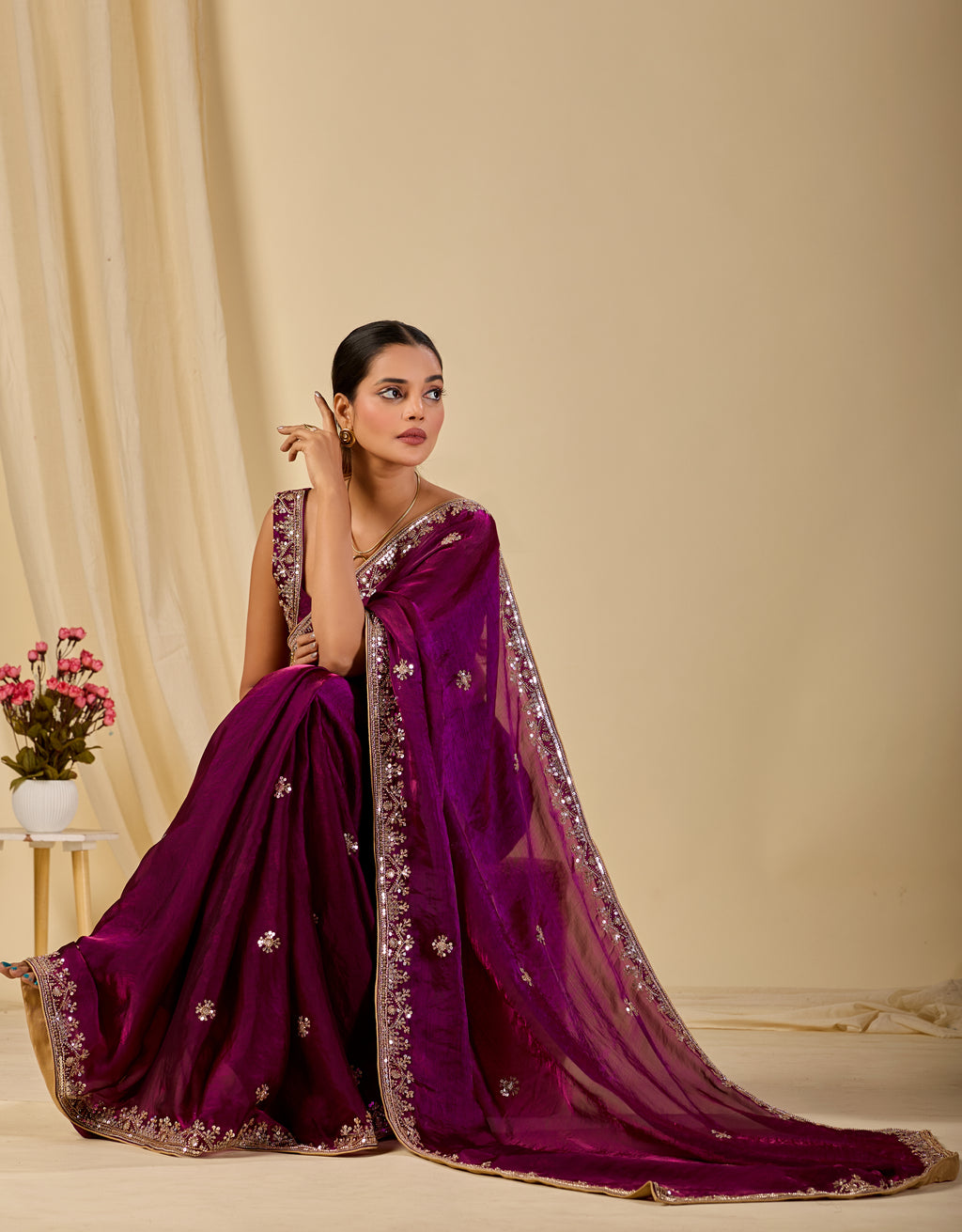 Rich wine purple organza saree with detailed sequin border