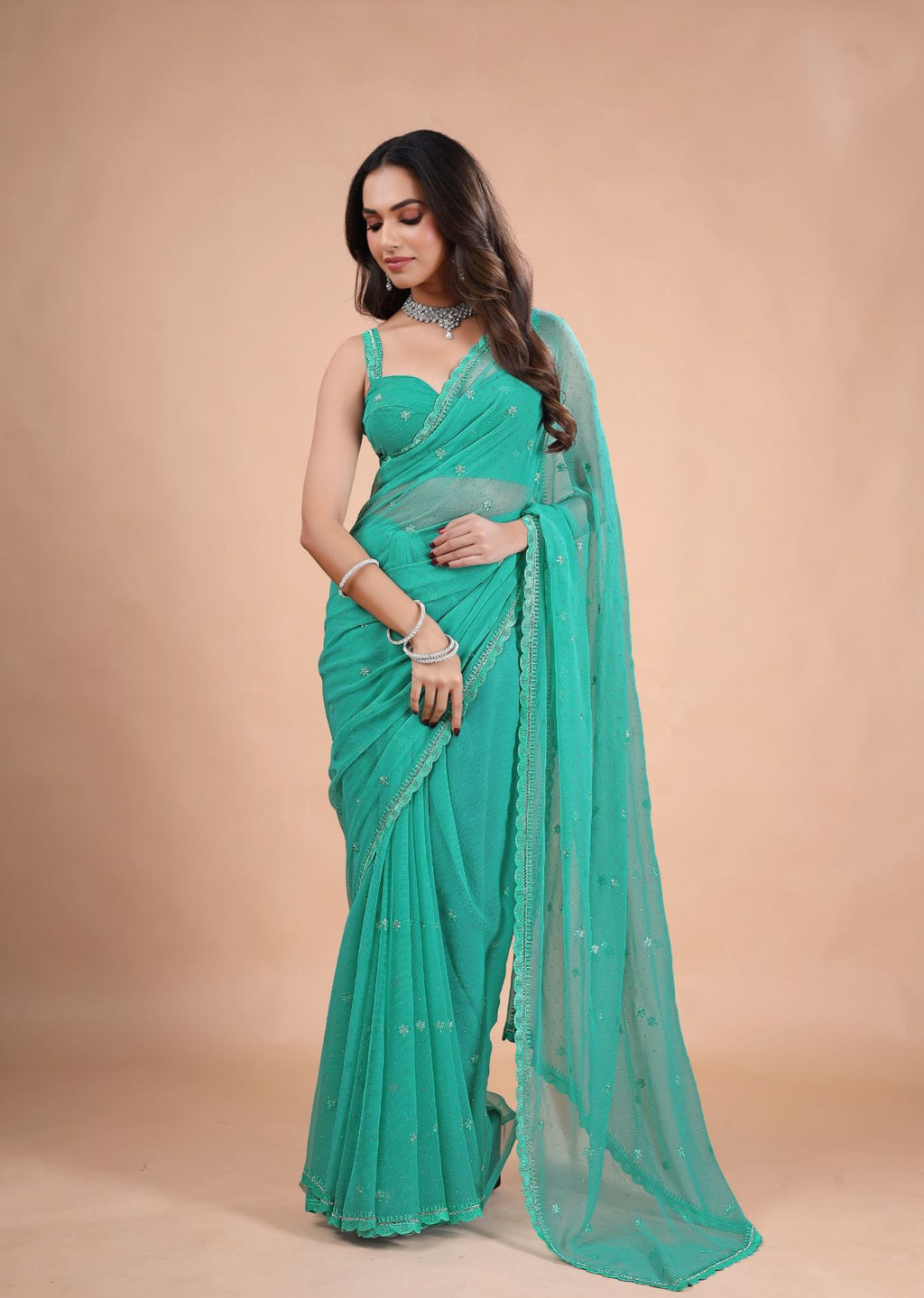 Sea Green Organza Saree with Zari Floral Buti & Stone Work Border