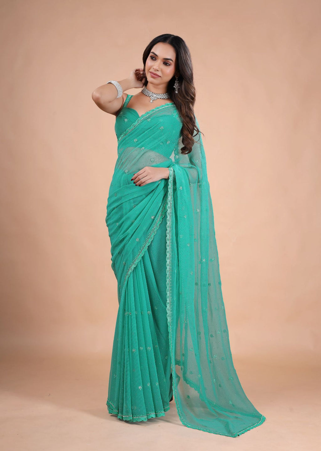 Sea Green Organza Saree with Zari Floral Buti & Stone Work Border