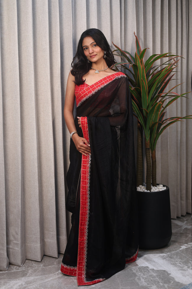 Black Linen Silk Saree with Red Bandhani Border & Foil Work Blouse – Elegant Festive & Party Wear Saree for Women Hover Image