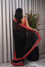 Black Linen Silk Saree with Red Bandhani Border & Foil Work Blouse – Elegant Festive & Party Wear Saree for Women