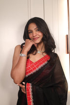 Black Linen Silk Saree with Red Bandhani Border & Foil Work Blouse – Elegant Festive & Party Wear Saree for Women