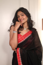 Black Linen Silk Saree with Red Bandhani Border & Foil Work Blouse – Elegant Festive & Party Wear Saree for Women