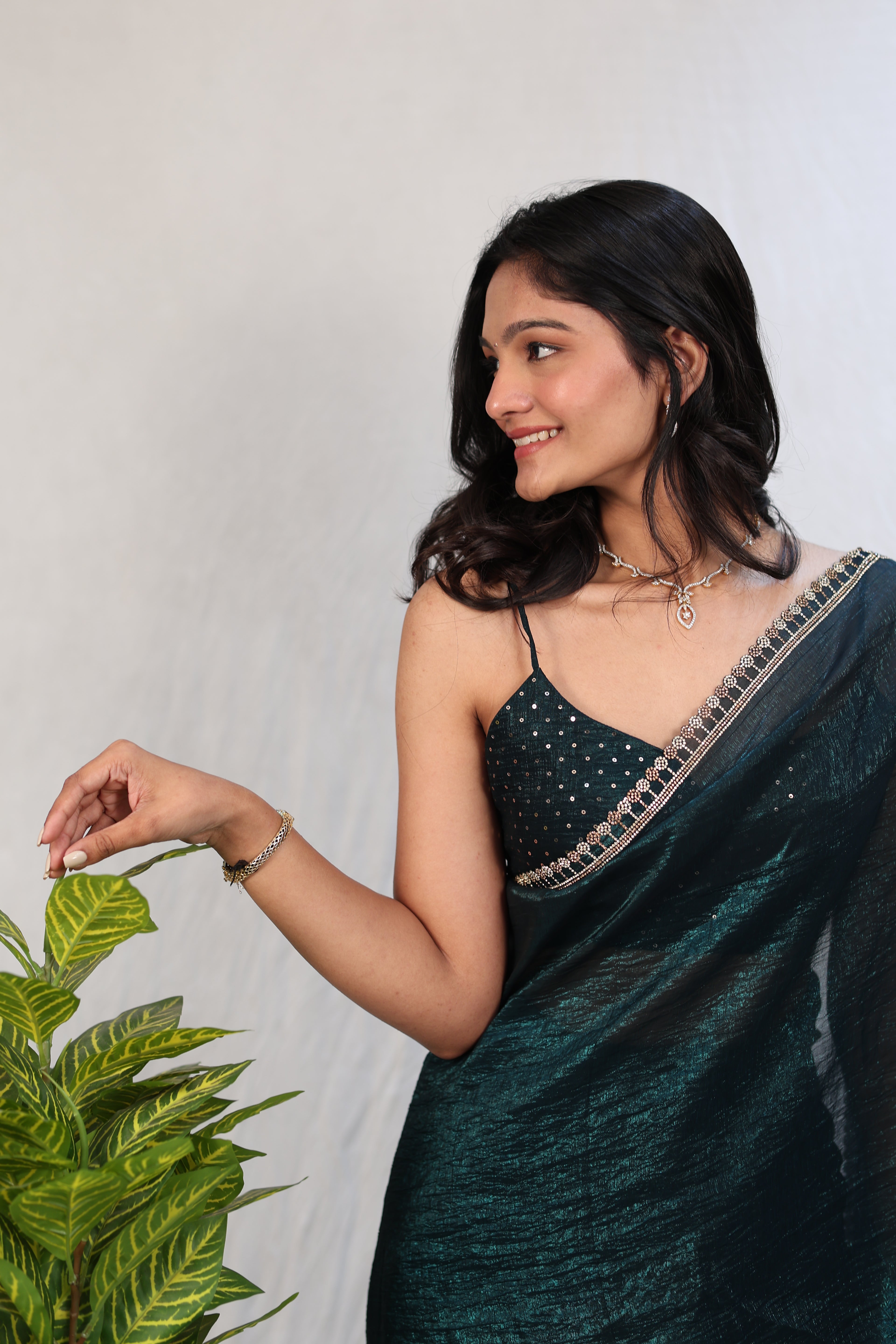 Bottle Green Satin Silk Saree with Sequin Work & Designer Stone Border – Party Wear