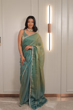 Pastel Mint Green Satin Silk Saree with Printed Blouse & Designer Lace Border – Festive Wear