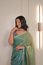 Pastel Mint Green Satin Silk Saree with Printed Blouse & Designer Lace Border – Festive Wear