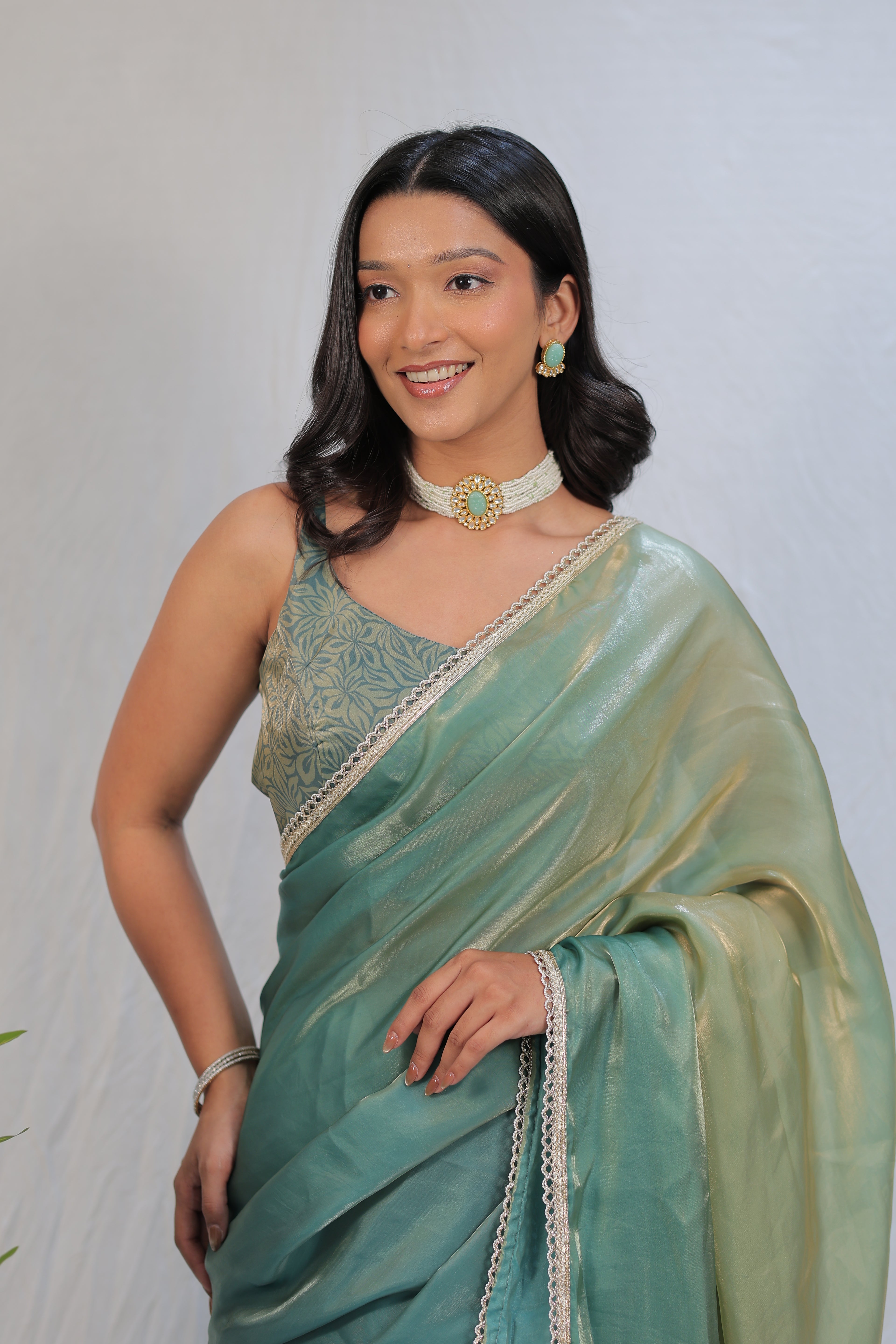 Pastel Mint Green Satin Silk Saree with Printed Blouse & Designer Lace Border – Festive Wear