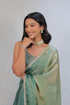 Pastel Mint Green Satin Silk Saree with Printed Blouse & Designer Lace Border – Festive Wear