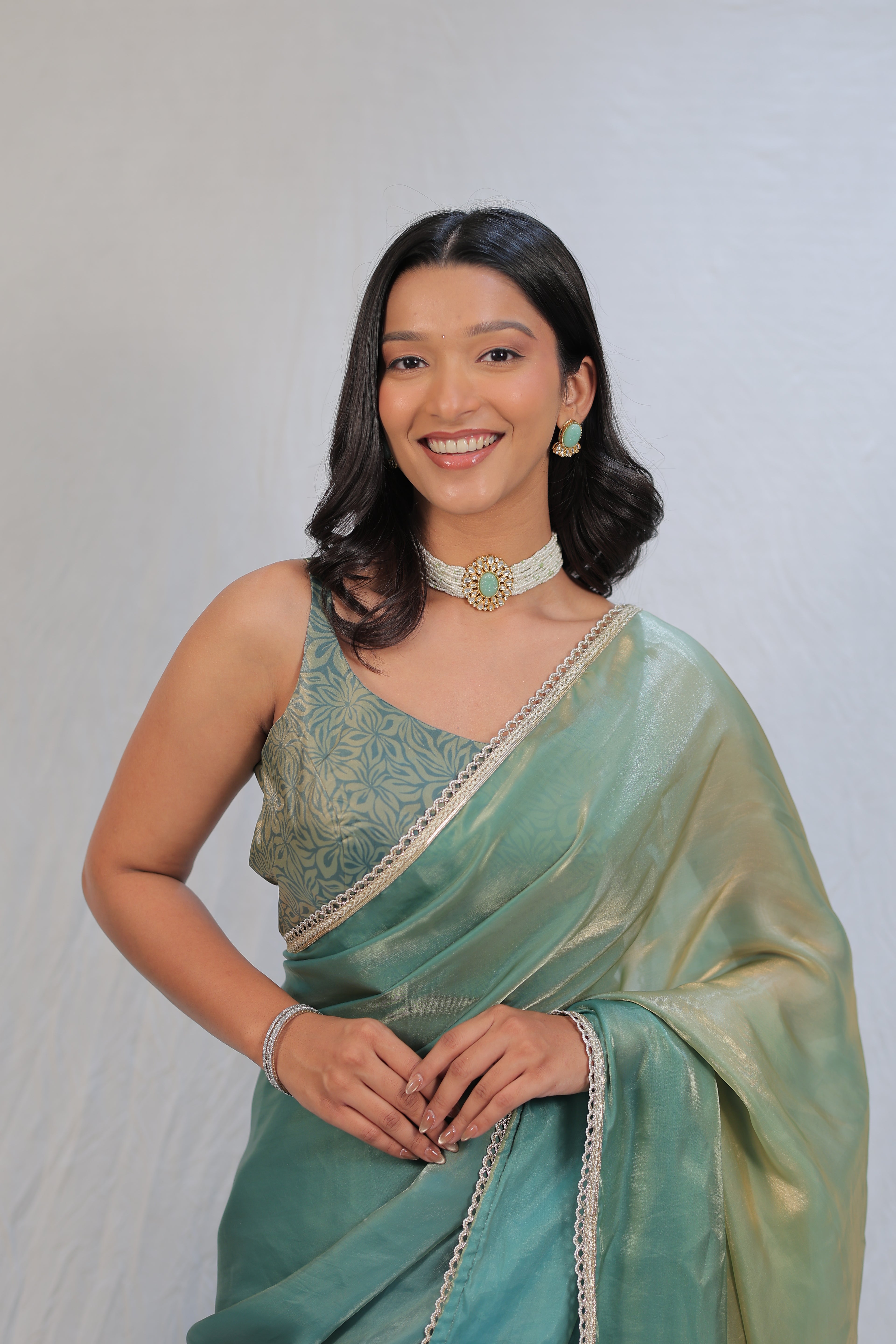Pastel Mint Green Satin Silk Saree with Printed Blouse & Designer Lace Border – Festive Wear