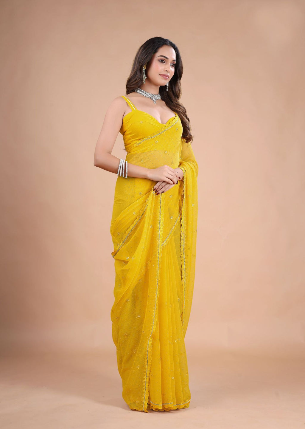 Sea Green Organza Saree with Zari Floral Buti & Stone Work Border