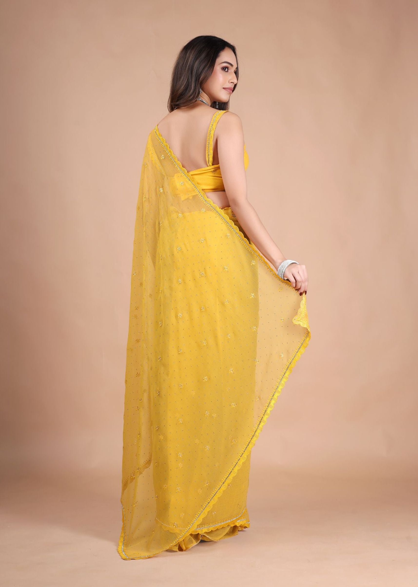 Sea Green Organza Saree with Zari Floral Buti & Stone Work Border