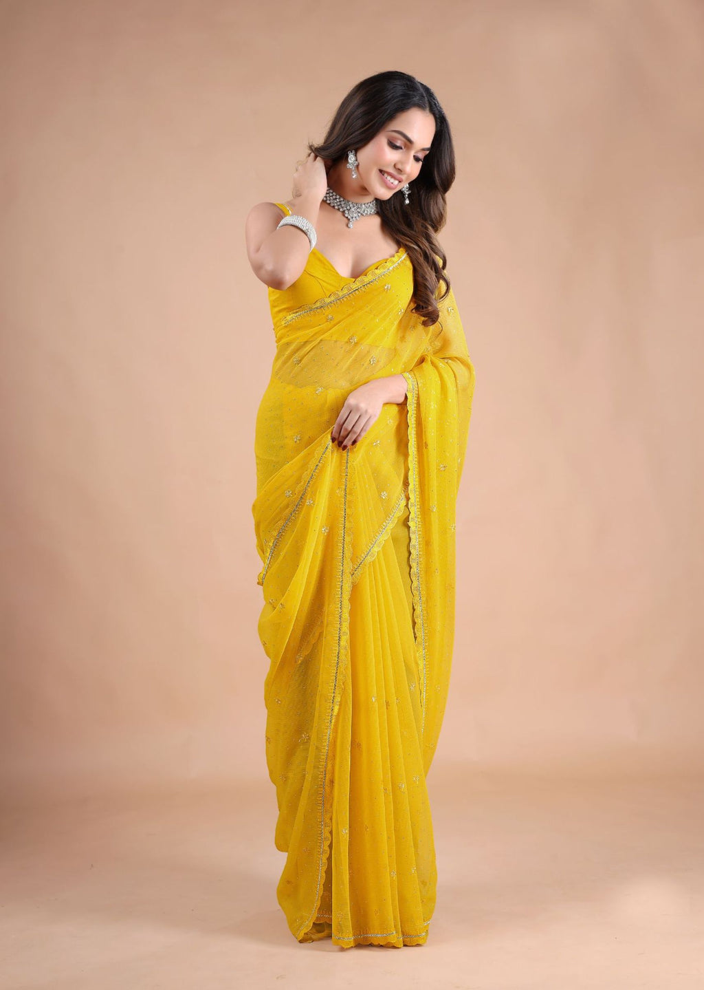Sea Green Organza Saree with Zari Floral Buti & Stone Work Border