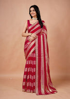 Black & Gold Organza Saree with Metallic Stripe Print and Stone Work Border