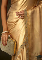 Golden Satin Silk Saree With Leaf Motifs And Embellished Border