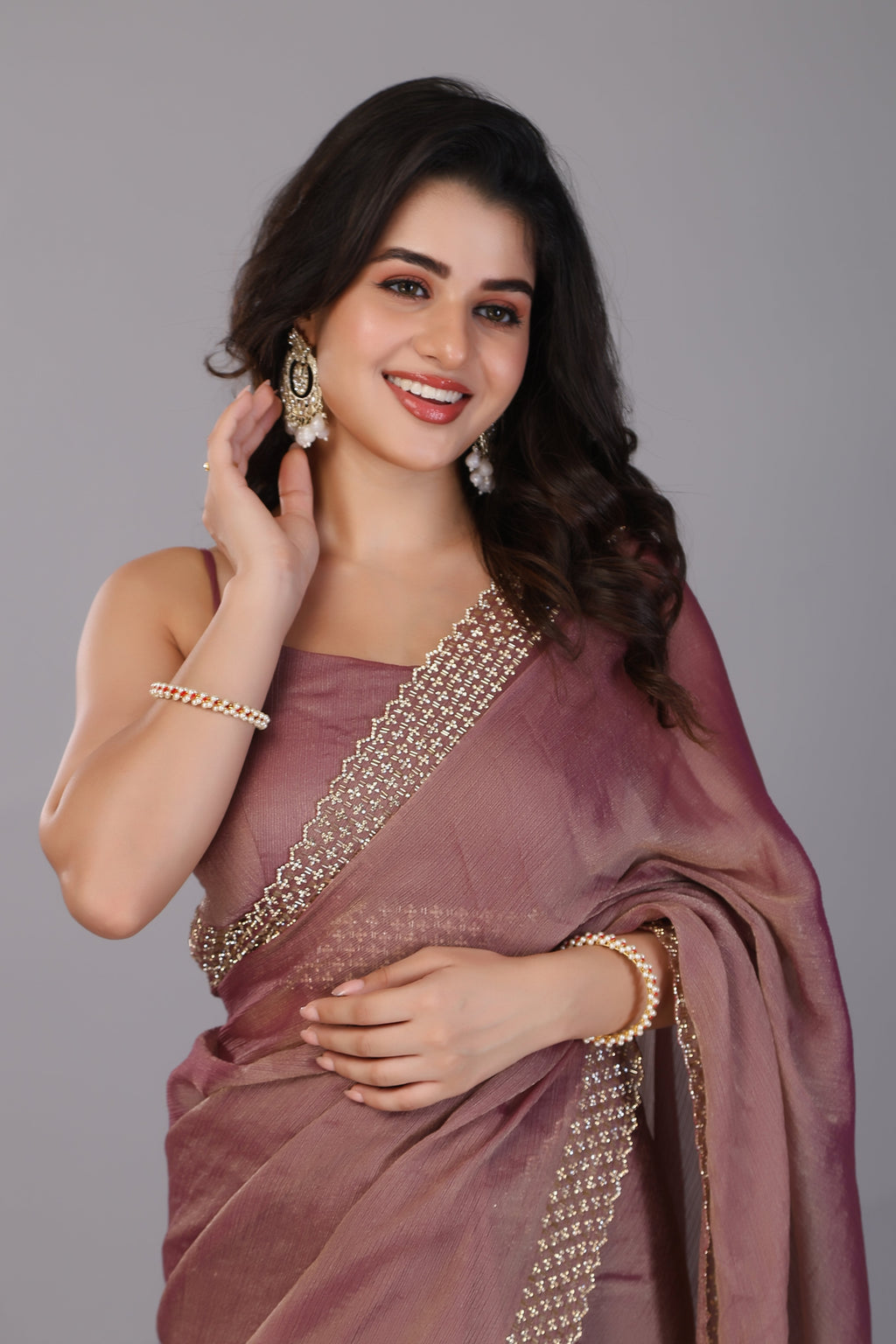 Brown stone work soft tissue saree