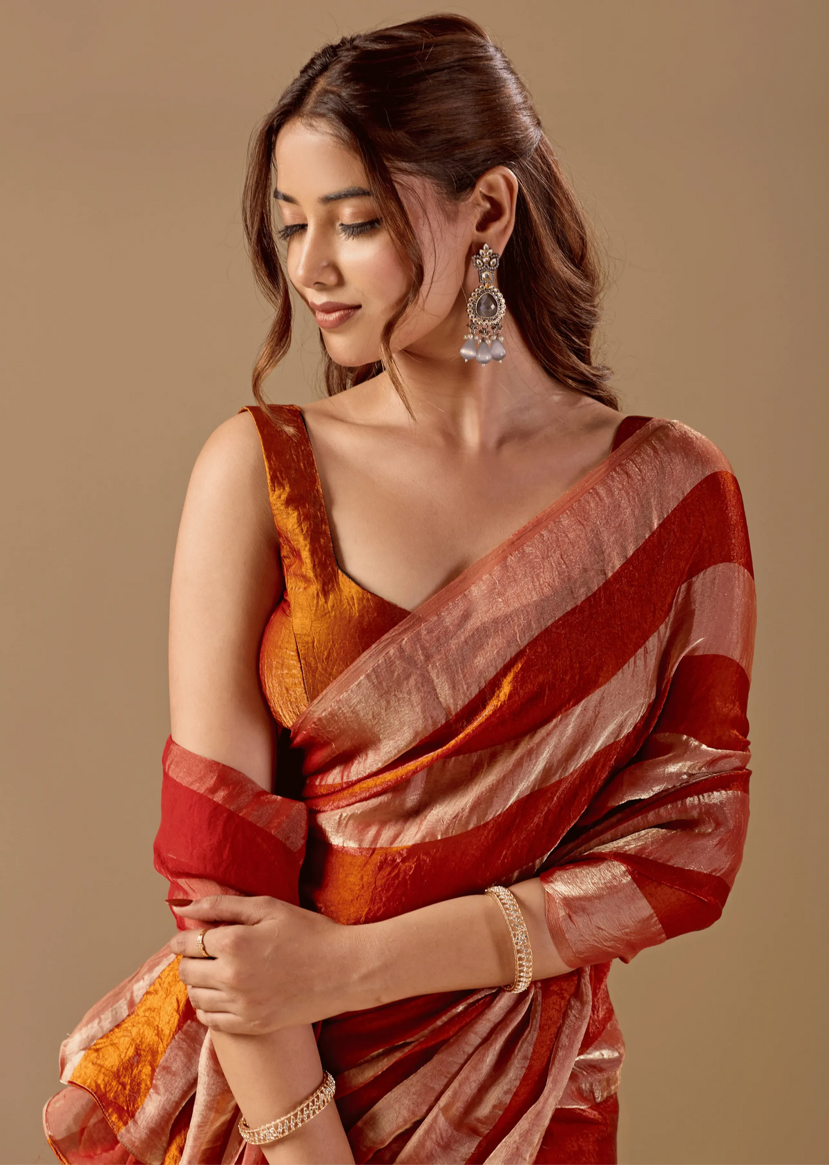 Copper Rust Tissue Silk Saree With Metallic Stripe Weave