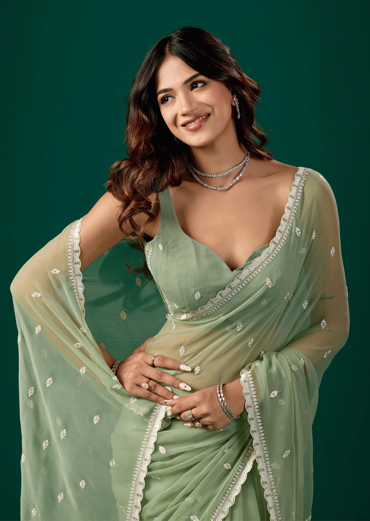 Pista Green Chiffon Saree Draped Pose - Festive Wear Saree