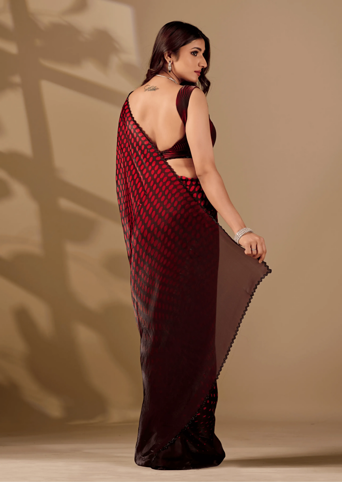 Ruby Red Organza Silk Saree Back Pose - Stone Work Border Detail