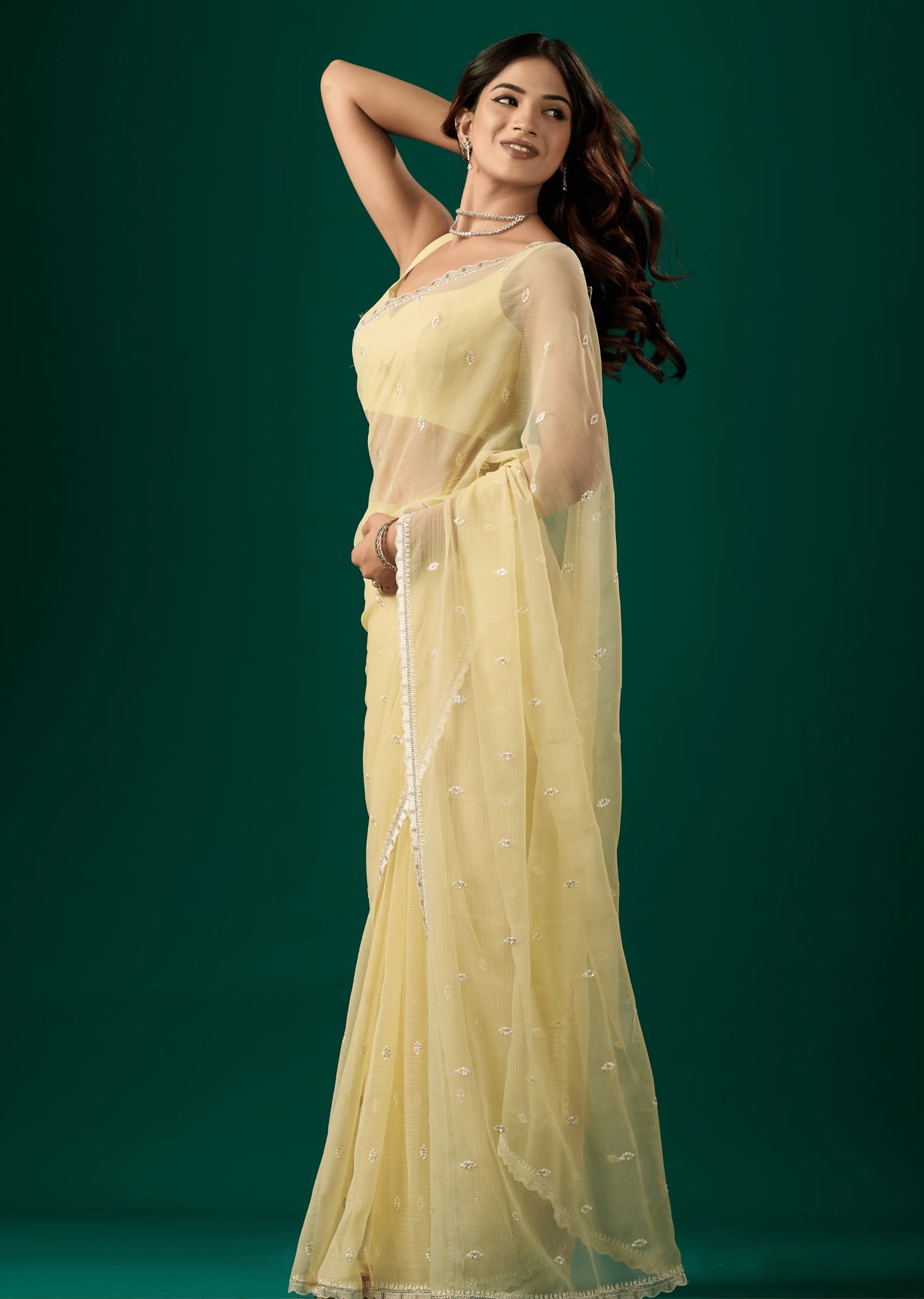Light Yellow Chiffon Saree Standing Pose - Festive Wear Saree