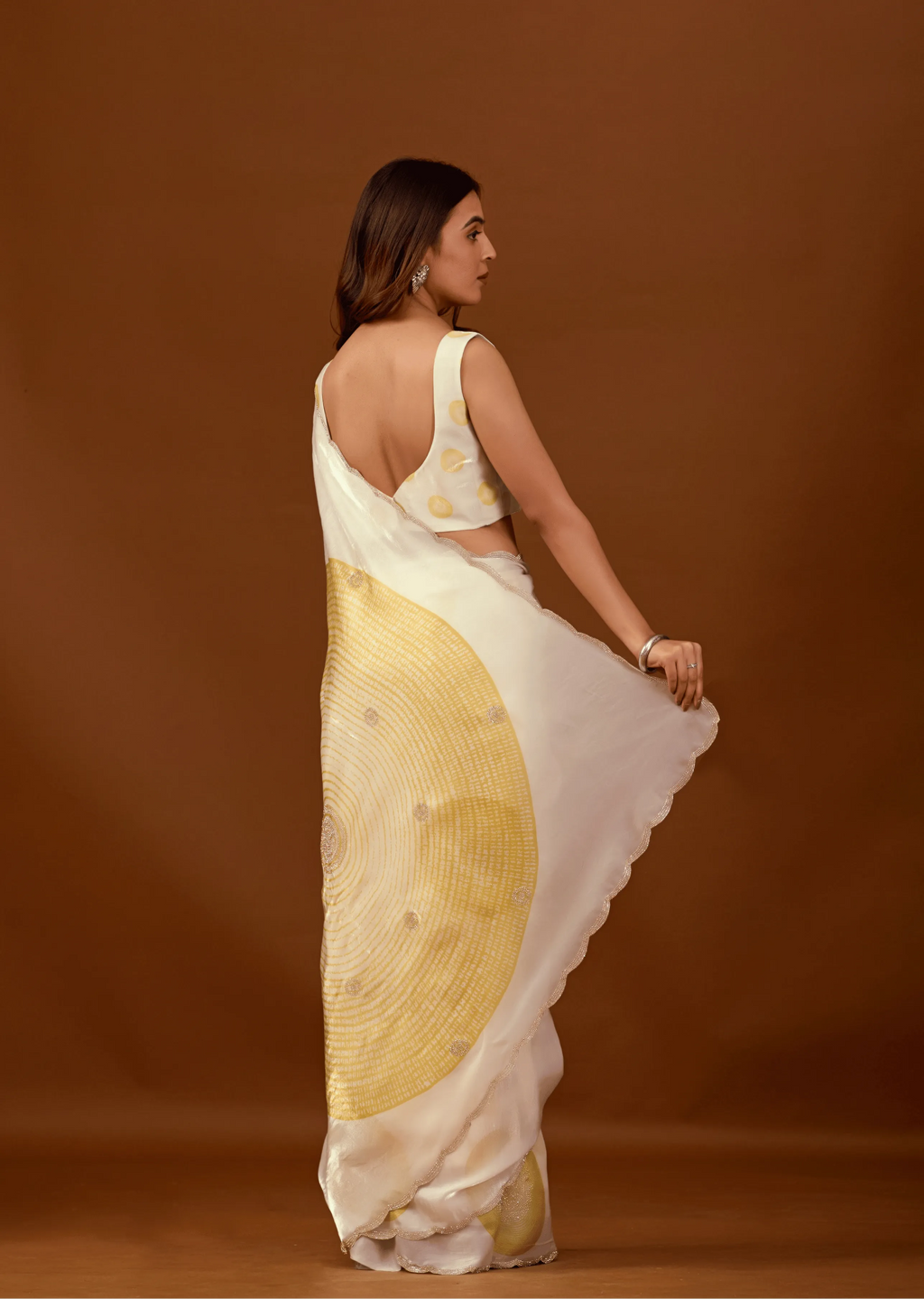 Ivory Organza Silk Saree Back Pose - Stone Work Detail