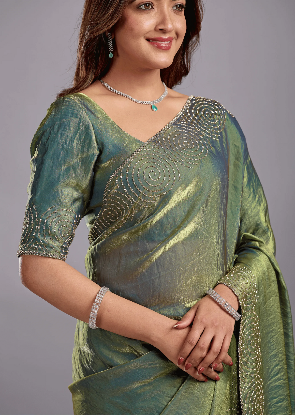 Olive Green Tissue Silk Saree With Crystal Spiral Work