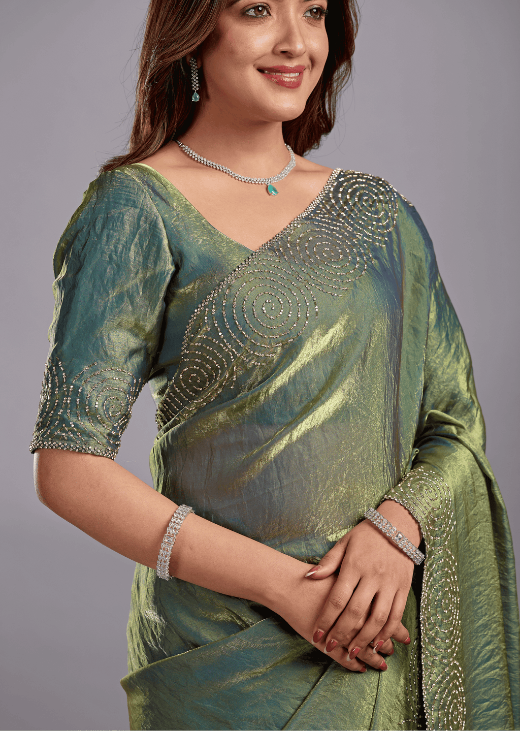 Olive Green Tissue Silk Saree With Crystal Spiral Work