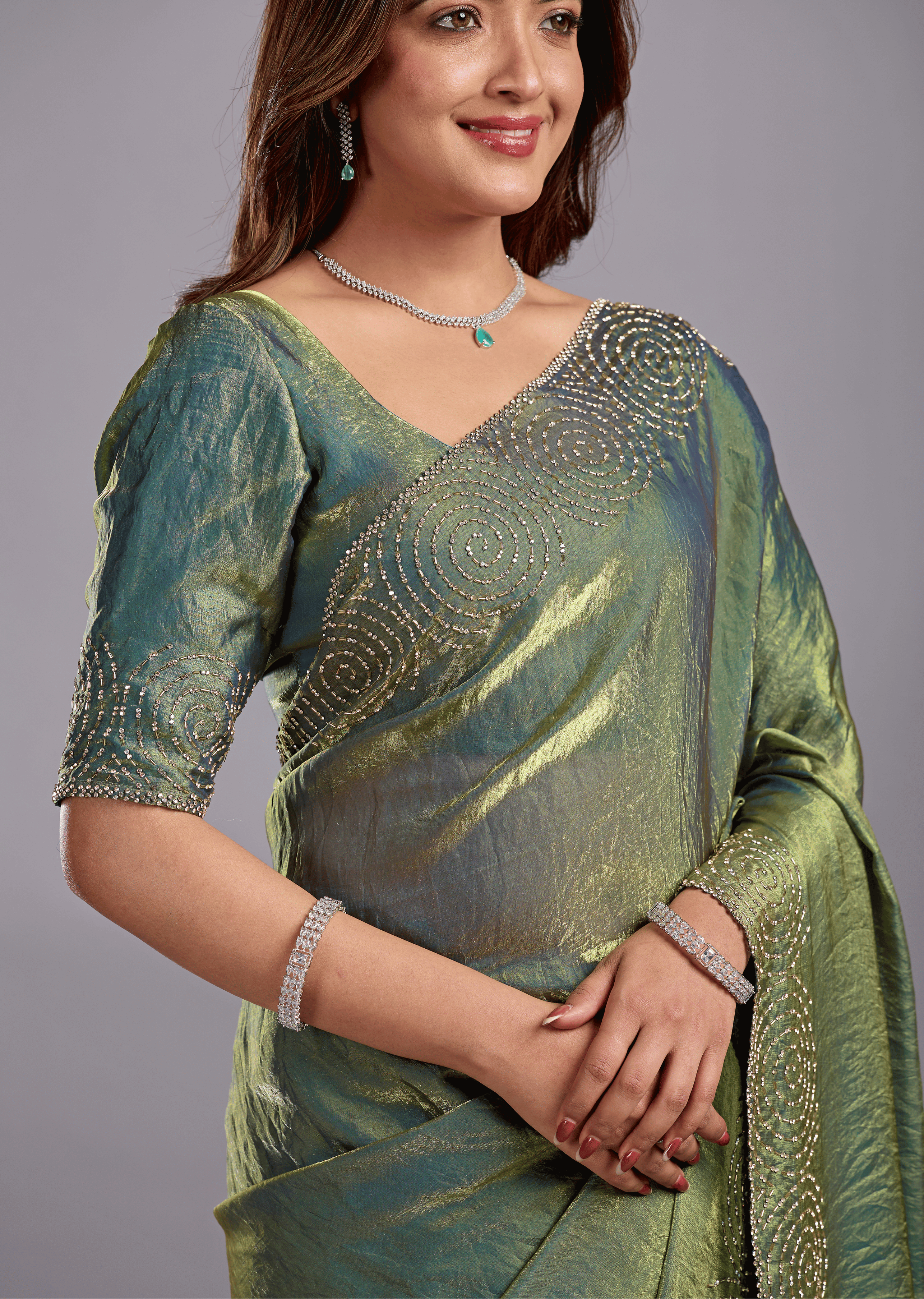 Olive Green Tissue Silk Saree With Crystal Spiral Work