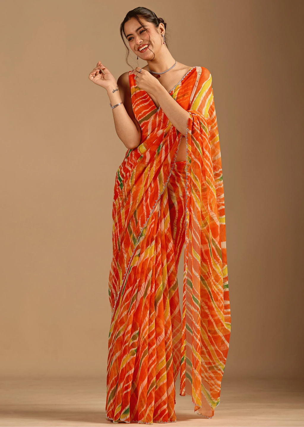 Orange Chiffon Saree Side Pose - Festive Wear Saree