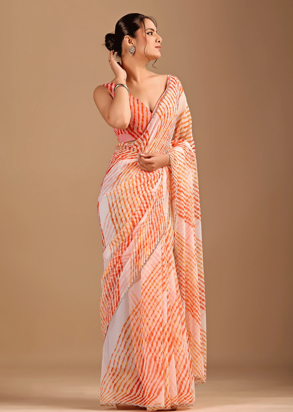 Peach Orange Chiffon Saree Standing Look - Party Wear Saree