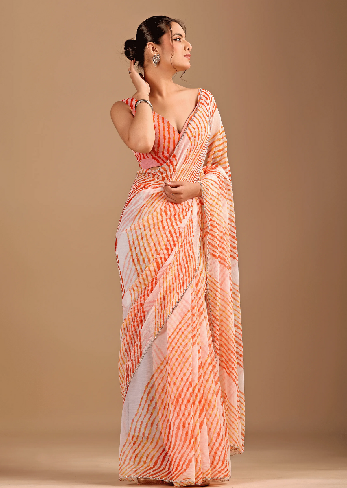 Peach Orange Chiffon Saree Standing Look - Party Wear Saree