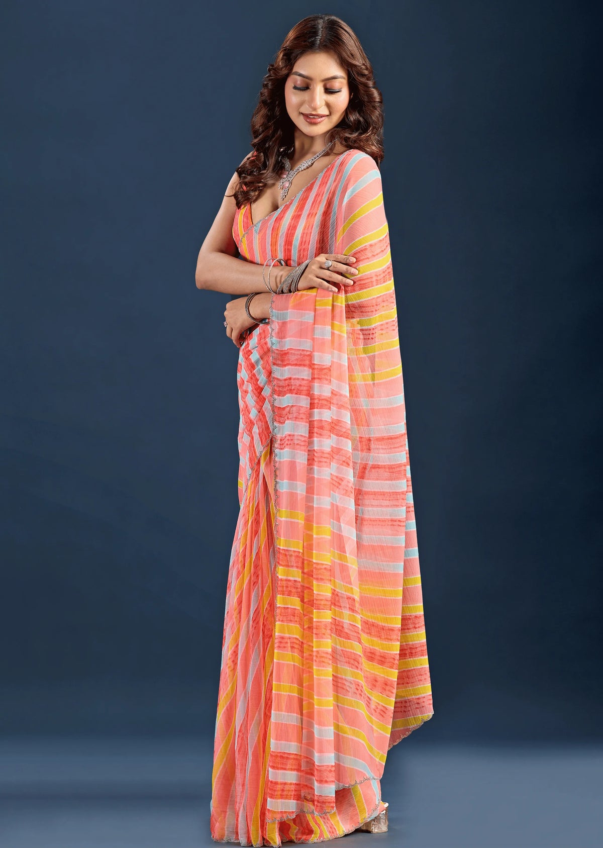 Yellow Red Chiffon Saree Standing Look - Festive Wear Saree