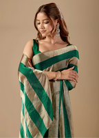 Emerald Green Tissue Silk Saree With Metallic Stripe Weave