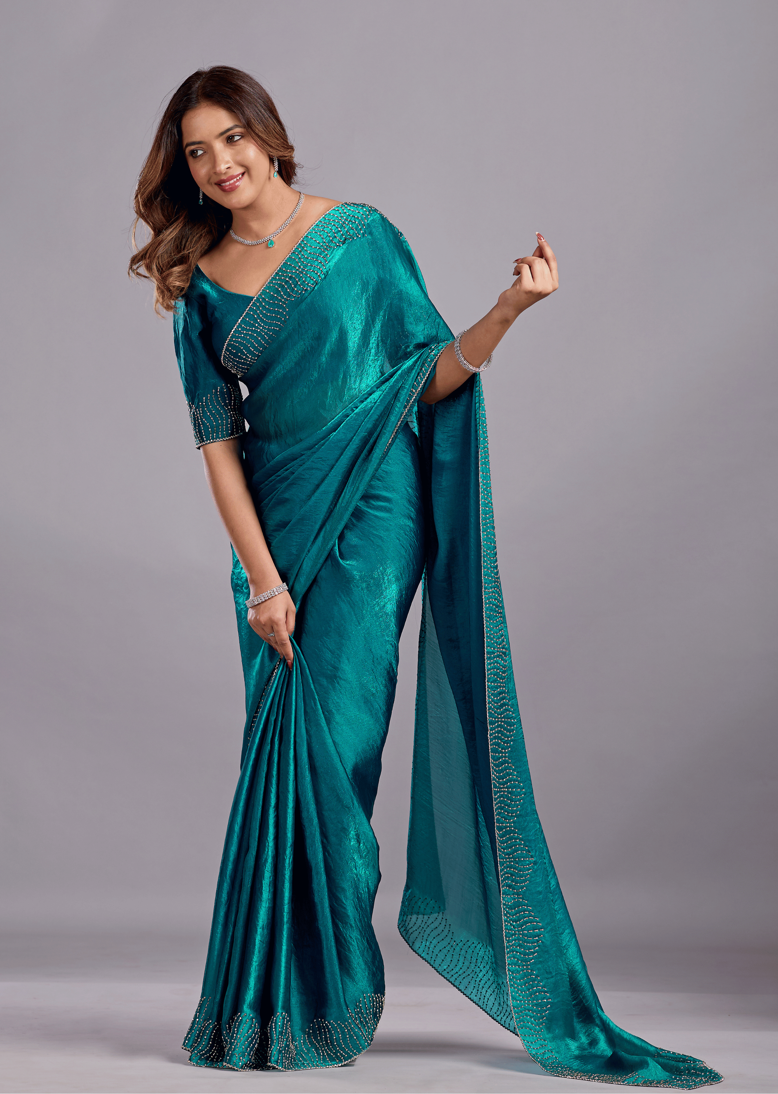 Teal Blue Tissue Silk Saree With Stone Work