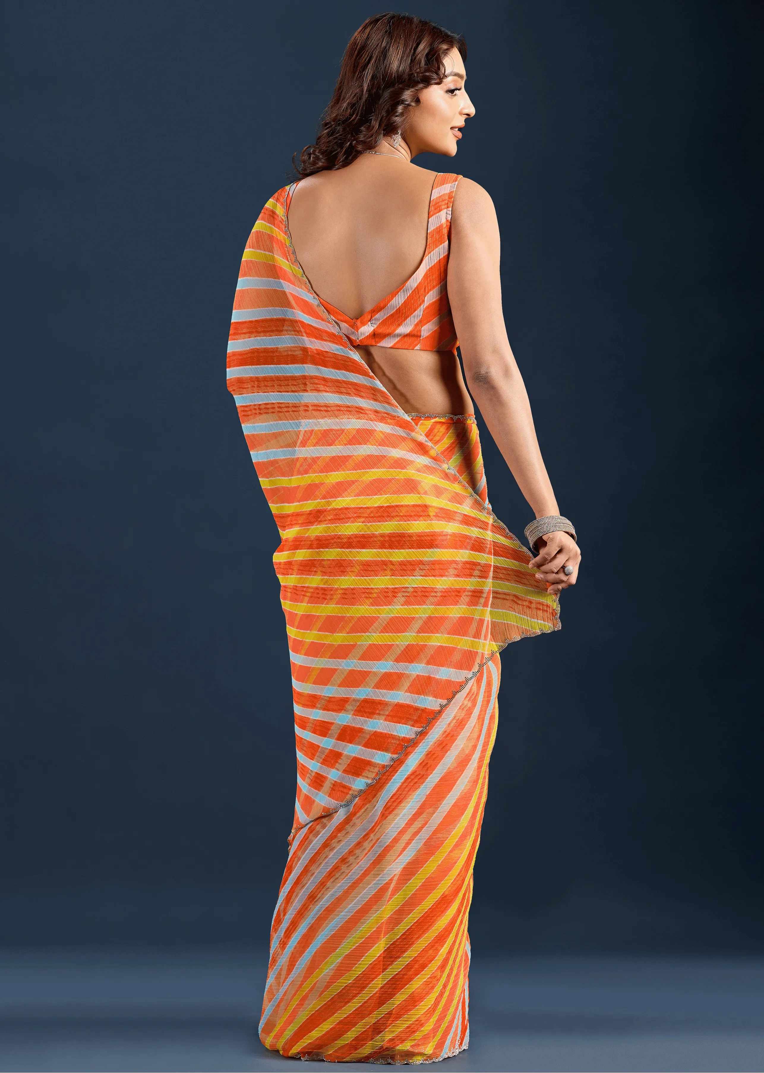 Orange Chiffon Saree Back Pose - Striped Print Detail